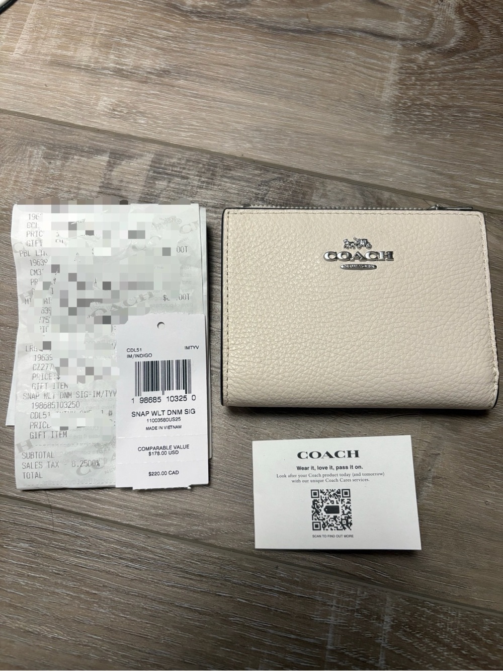 Coach Cream Pebbled Leather Bifold Wallet with Silver Logo